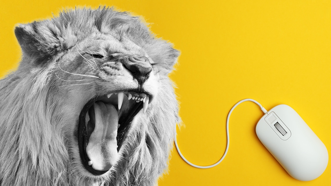 lion roaring with computer mouse